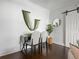 Small dining area with a simple table and chairs at 65 N Logan St # B4, Denver, CO 80203