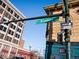 Street view showing the Broadway street sign and nearby buildings at 65 N Logan St # B4, Denver, CO 80203