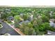 Breathtaking aerial view of a neighborhood with mature trees and well-kept properties at 16416 E Powers Pl, Centennial, CO 80015