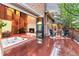 A stunning indoor-outdoor space with hot tub and fireplace, seamlessly blending luxury at 16416 E Powers Pl, Centennial, CO 80015