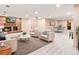 Finished basement featuring a brick fireplace, seating area, and a ping pong table at 16416 E Powers Pl, Centennial, CO 80015