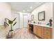 Spacious bathroom with double vanity, modern fixtures, and neutral decor at 16416 E Powers Pl, Centennial, CO 80015