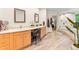 Bright bathroom with double vanity, spacious counters, and a walk-in shower at 16416 E Powers Pl, Centennial, CO 80015