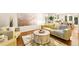 Inviting living room featuring modern furnishings, wood floors, and stylish decor at 16416 E Powers Pl, Centennial, CO 80015