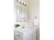 Bathroom sink with mirror, towel rack and updated fixtures at 9000 W 4Th Pl, Lakewood, CO 80226