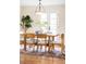 Dining room with modern light fixture and access to an outdoor area at 9000 W 4Th Pl, Lakewood, CO 80226