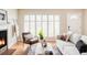 Cozy living room with natural light, stylish decor, and hardwood floors at 9000 W 4Th Pl, Lakewood, CO 80226