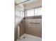 Bathroom tiled walk-in shower with a window at 9000 W 4Th Pl, Lakewood, CO 80226