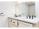 Bathroom with double vanity and granite countertop at 5385 Camargo Rd, Littleton, CO 80123