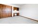 Bedroom with built-in desk and double door closet at 5385 Camargo Rd, Littleton, CO 80123