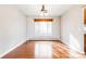 Spacious dining room with hardwood floors and a chandelier at 5385 Camargo Rd, Littleton, CO 80123