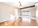 Bright dining room with hardwood floors and large windows at 5385 Camargo Rd, Littleton, CO 80123