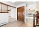 Entryway with wood-paneled wall and closet at 5385 Camargo Rd, Littleton, CO 80123