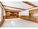 Gathering room with brick fireplace and built-in shelving at 5385 Camargo Rd, Littleton, CO 80123