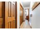 Hallway with wood flooring and access to other rooms at 5385 Camargo Rd, Littleton, CO 80123