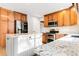 Modern kitchen with stainless steel appliances and granite countertops at 5385 Camargo Rd, Littleton, CO 80123