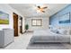 Spacious main bedroom with ensuite bathroom and ceiling fan at 5385 Camargo Rd, Littleton, CO 80123