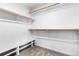 Spacious walk-in closet with built-in shelves and rod at 5385 Camargo Rd, Littleton, CO 80123