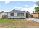 Well-maintained single-story home with fresh landscaping and a newly paved driveway at 742 Hanover St, Aurora, CO 80010
