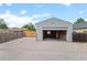 Spacious detached garage with a work area and ample storage space at 742 Hanover St, Aurora, CO 80010