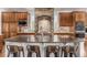 A kitchen showcases a large island with granite countertops and stainless steel appliances at 9518 Shenstone Dr, Parker, CO 80134
