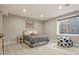 Cozy bedroom with natural light, carpeted floor, and charming decor at 7947 Monarch Rd, Larkspur, CO 80118