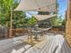 Backyard patio with overhead cover, outdoor furniture and hammock at 17404 E Prentice Cir, Centennial, CO 80015