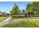 Charming clubhouse featuring stone accents, manicured landscaping, and a welcoming entrance at 17404 E Prentice Cir, Centennial, CO 80015