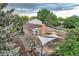 Aerial view of the backyard patio with shade sails, a hammock, and outdoor furniture at 17404 E Prentice Cir, Centennial, CO 80015