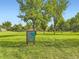 Scenic view of Big Rock Park with a sign highlighting park regulations and beautiful trees at 17404 E Prentice Cir, Centennial, CO 80015