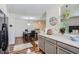 Efficient kitchen featuring modern appliances and an open view to the dining area, ideal for cooking and entertaining guests at 8438 Prairie Clover Way, Parker, CO 80134