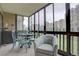 Relaxing sunroom with views, featuring comfortable seating and a tranquil atmosphere, perfect for enjoying the natural light at 13631 E Marina Dr # 109, Aurora, CO 80014