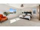Primary bedroom with neutral walls, ample natural light, and carpeted flooring at 10968 Lewiston St, Commerce City, CO 80022