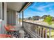 Inviting front porch with seating, offering neighborhood views and a relaxing outdoor space at 10968 Lewiston St, Commerce City, CO 80022