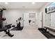 The workout area features multiple exercise machines and an adjoining room at 10968 Lewiston St, Commerce City, CO 80022