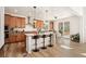 Modern kitchen featuring a large island, stainless steel appliances, and ample cabinet space at 10968 Lewiston St, Commerce City, CO 80022