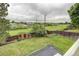 Overhead backyard view showing large grassy lawn, and fencing at 10137 W Berry Dr, Littleton, CO 80127