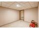 Unfinished basement offers potential with closet for storage and toy fire truck at 10137 W Berry Dr, Littleton, CO 80127