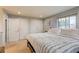 Comfortable bedroom featuring large windows and a relaxing atmosphere at 10137 W Berry Dr, Littleton, CO 80127