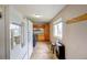 Large laundry room with washer, dryer and cabinetry at 10137 W Berry Dr, Littleton, CO 80127