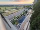 A balcony view with a stunning outdoor pool area visible in the apartment complex below at 7600 Landmark Way # 613-2, Greenwood Village, CO 80111