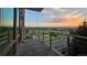 Scenic balcony view with metal railings looking out onto city buildings and the horizon at 7600 Landmark Way # 613-2, Greenwood Village, CO 80111