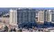 Contemporary high-rise condo building featuring modern architecture and a landscaped surrounding in an urban setting at 7600 Landmark Way # 613-2, Greenwood Village, CO 80111