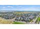Panoramic aerial view of a Primary-planned community featuring modern homes and green spaces at 5925 Hanover St, Denver, CO 80238