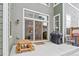 Outdoor patio includes sliding glass doors, a grill, and wooden picnic table at 5925 Hanover St, Denver, CO 80238