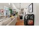 Open-concept living space with hardwood floors, ample natural light, and modern decor at 5925 Hanover St, Denver, CO 80238