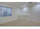 Finished basement area with neutral carpeting, recessed lighting and a window at 14656 W Vassar Dr, Lakewood, CO 80228
