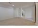 Finished basement area with neutral carpeting, recessed lighting and an entryway at 14656 W Vassar Dr, Lakewood, CO 80228