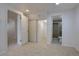 Finished basement area has a nearby door to bathroom and closet at 14656 W Vassar Dr, Lakewood, CO 80228