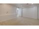 Finished basement area with neutral carpeting and recessed lighting at 14656 W Vassar Dr, Lakewood, CO 80228